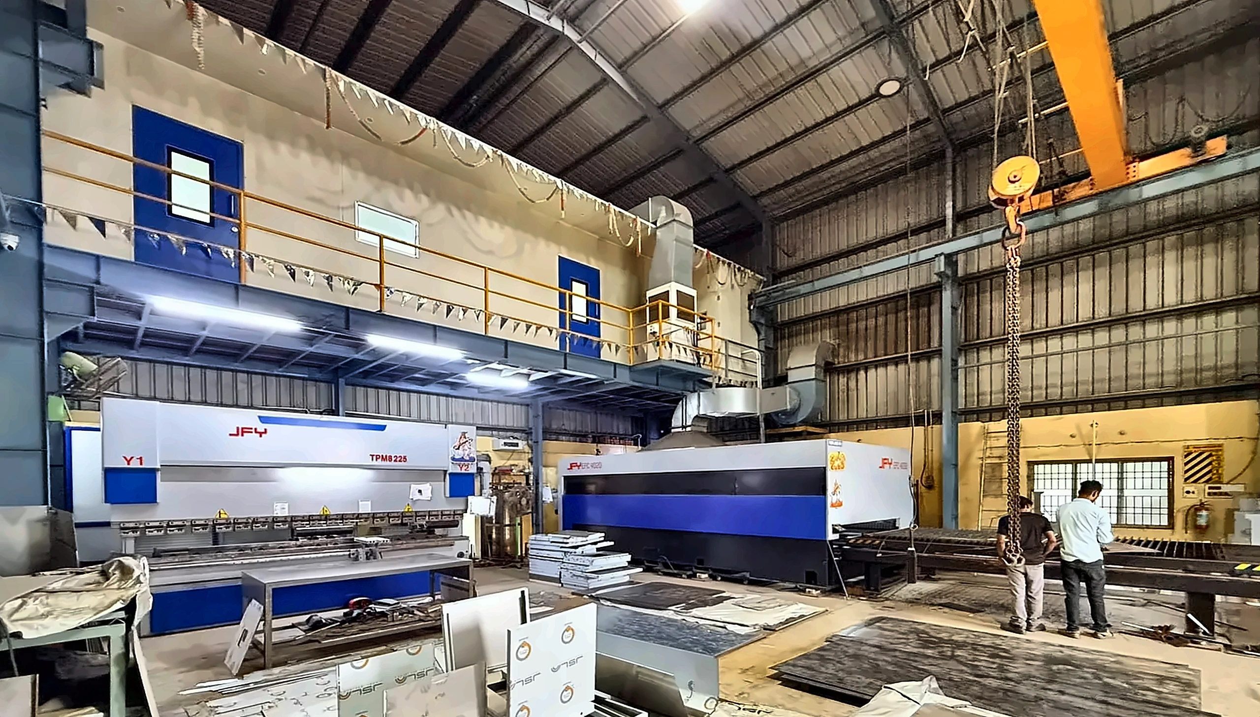 Rajeswari Engineering Works shop floor with the laser-cutting machine and EOT crane